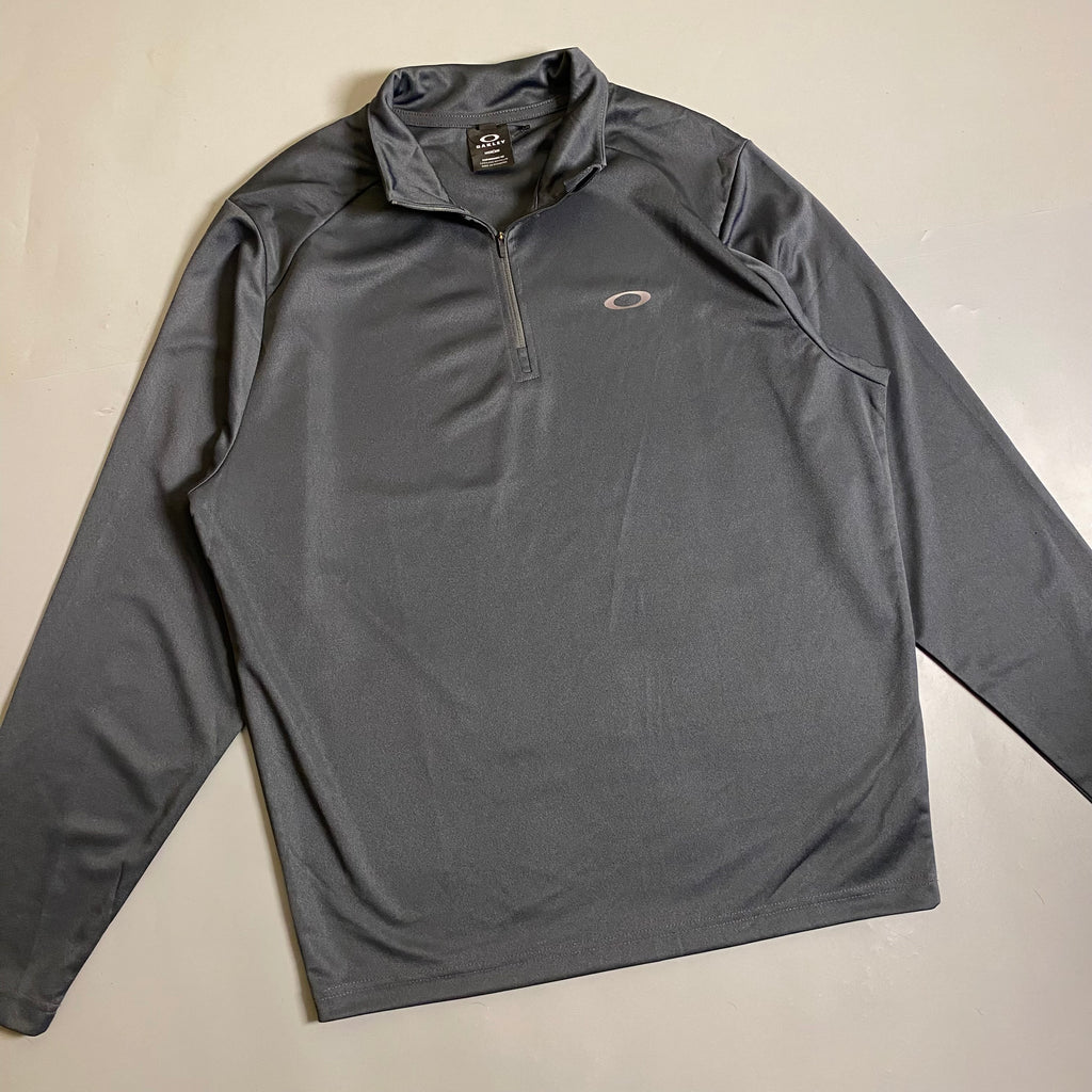Oakley Foundational 1/4 Zip pullover in a charcoal Colorway