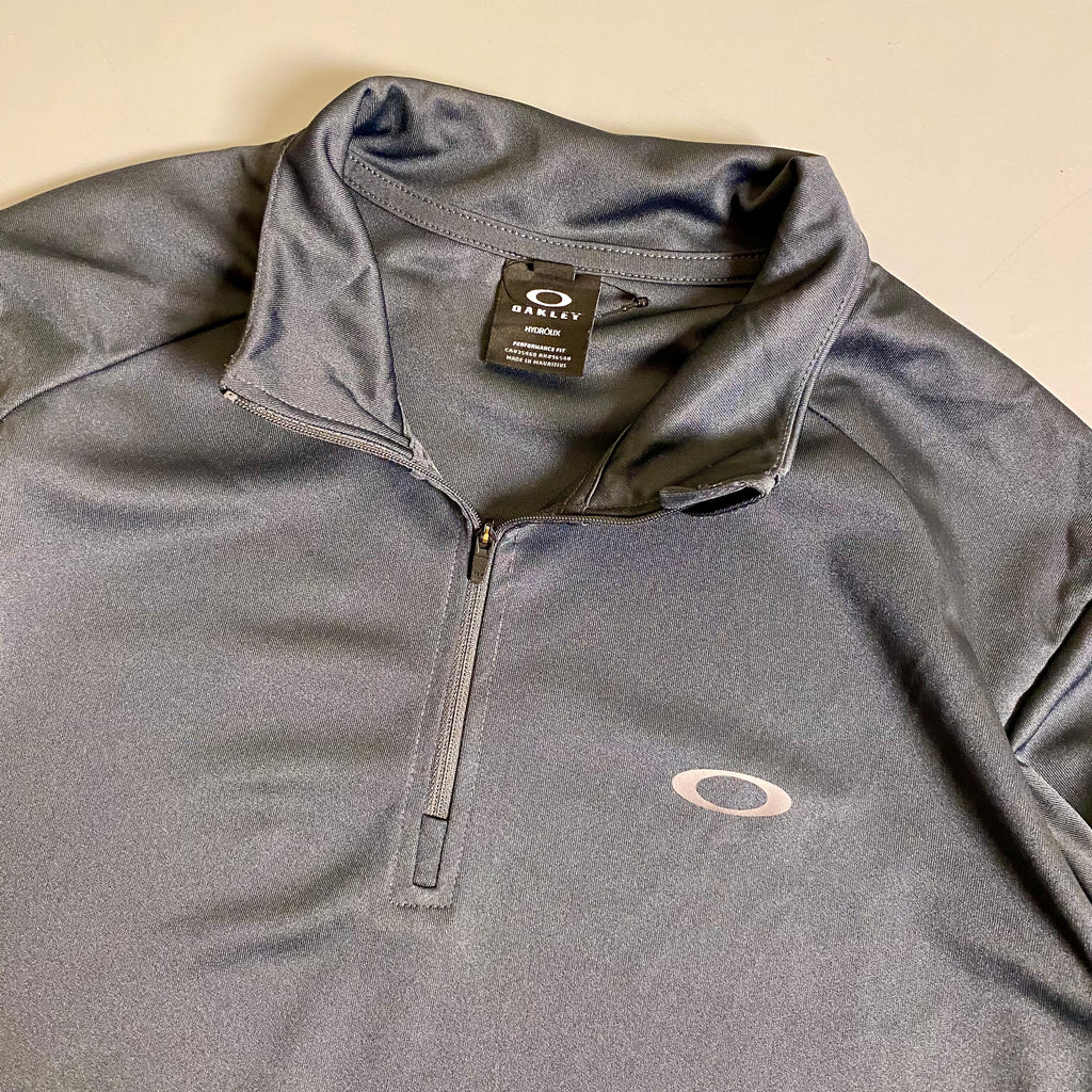 Oakley Foundational 1/4 Zip pullover in a charcoal Colorway