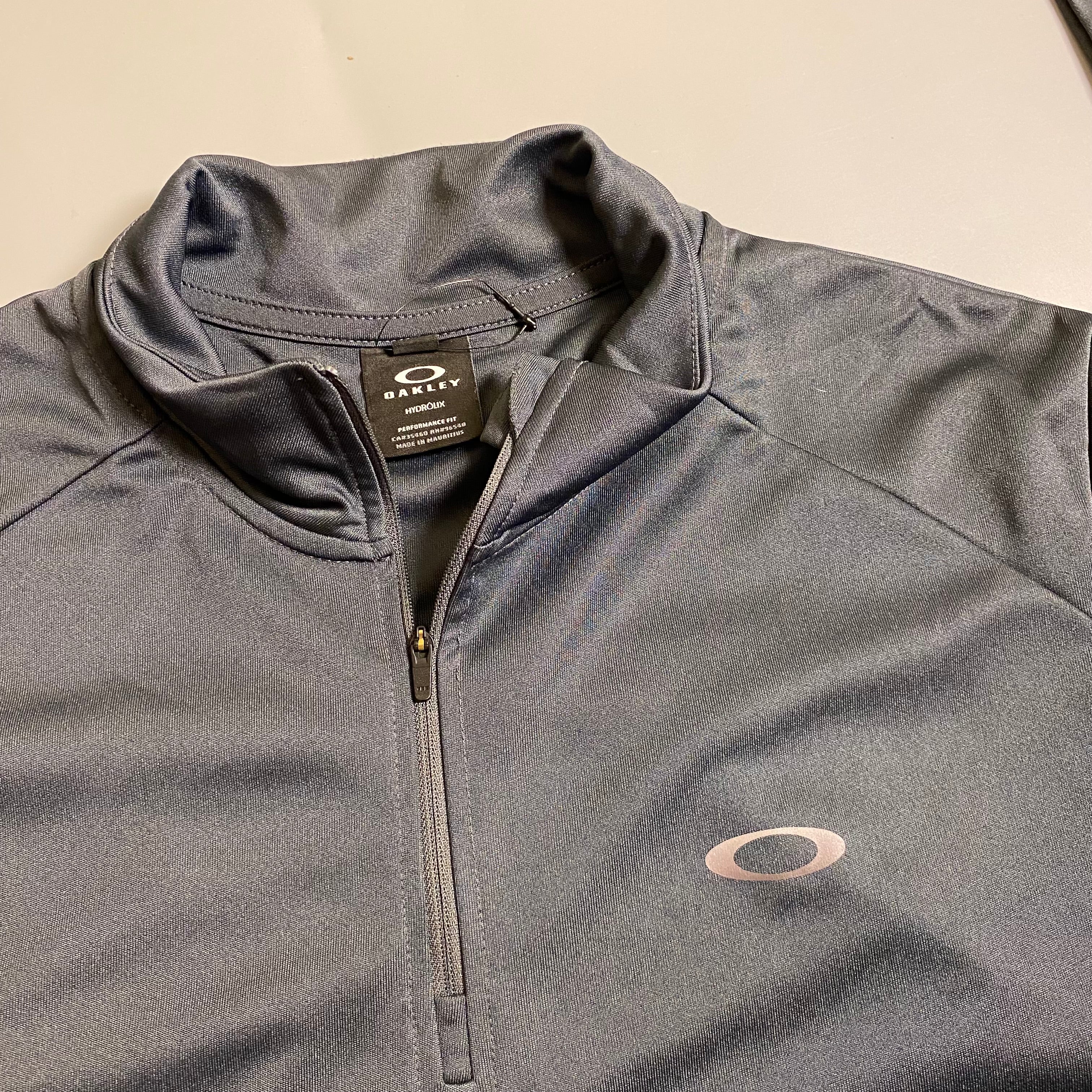 Oakley Foundational 1/4 Zip pullover in a charcoal Colorway