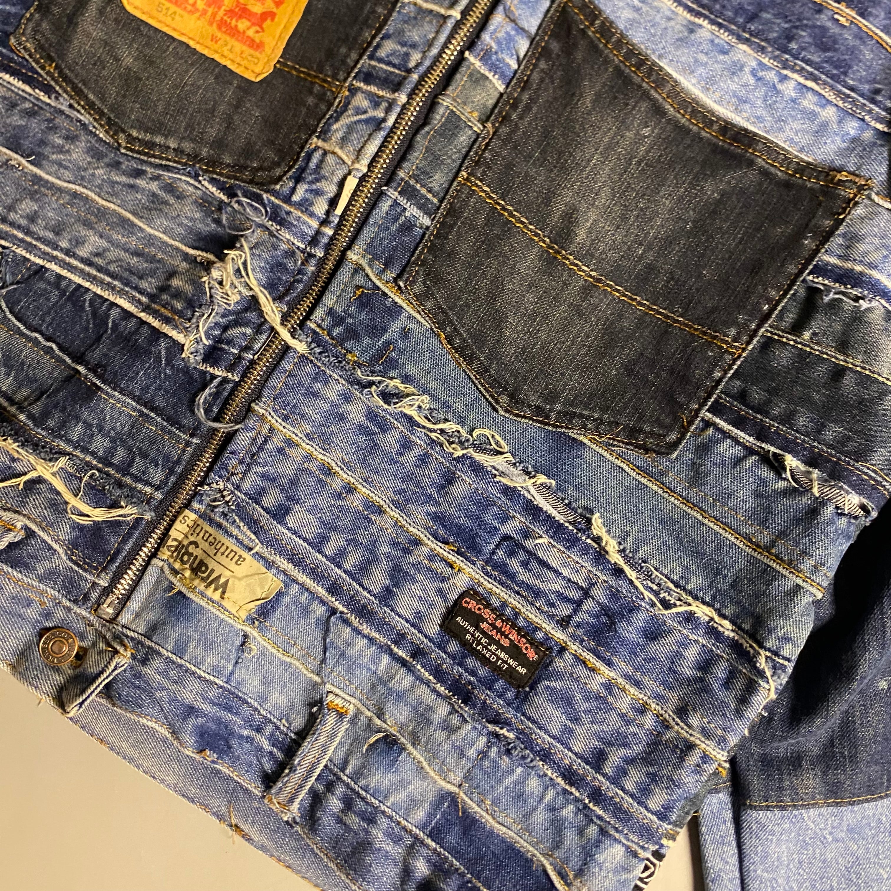 Custom upcycled patchwork denim jacket with a hoodie