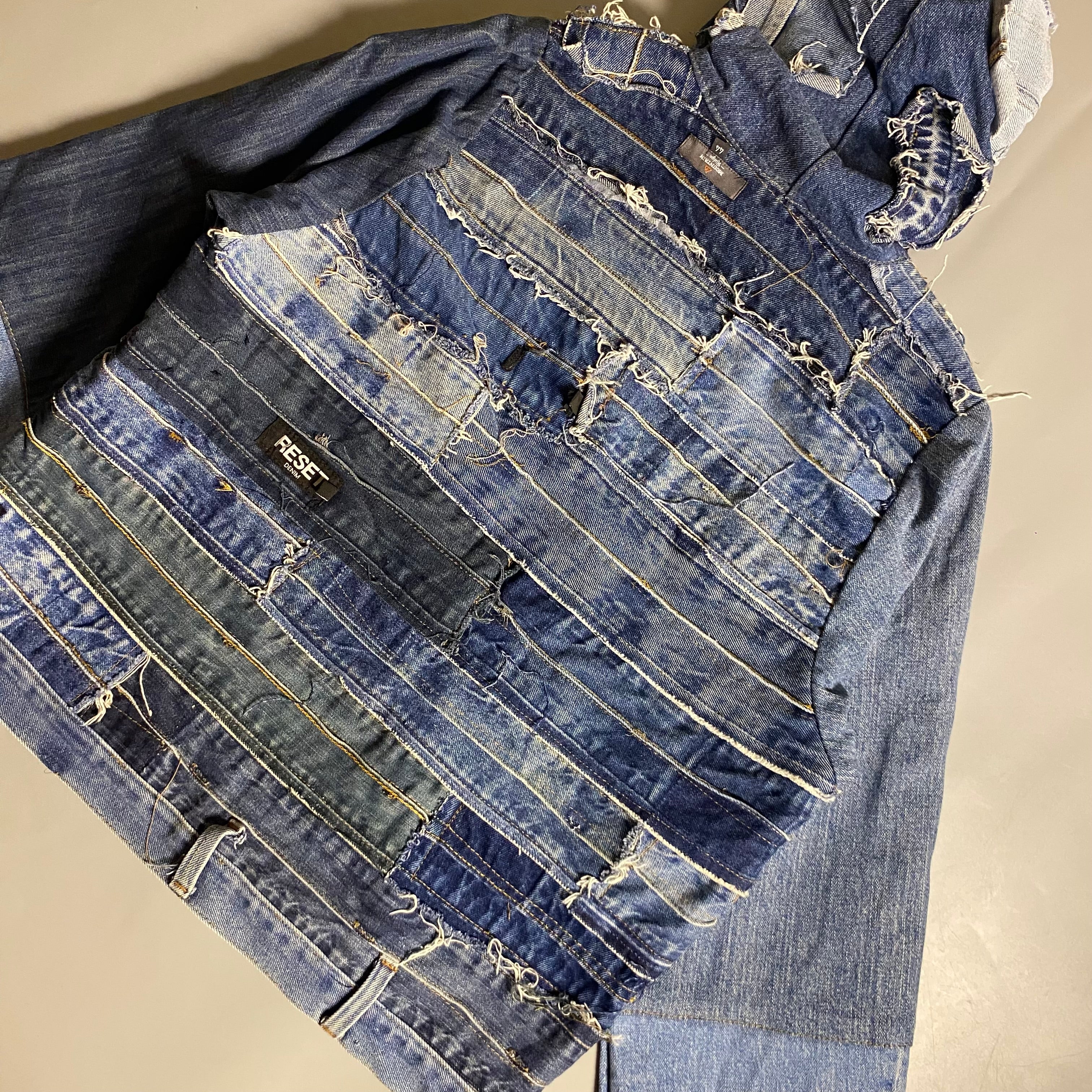 Custom upcycled patchwork denim jacket with a hoodie