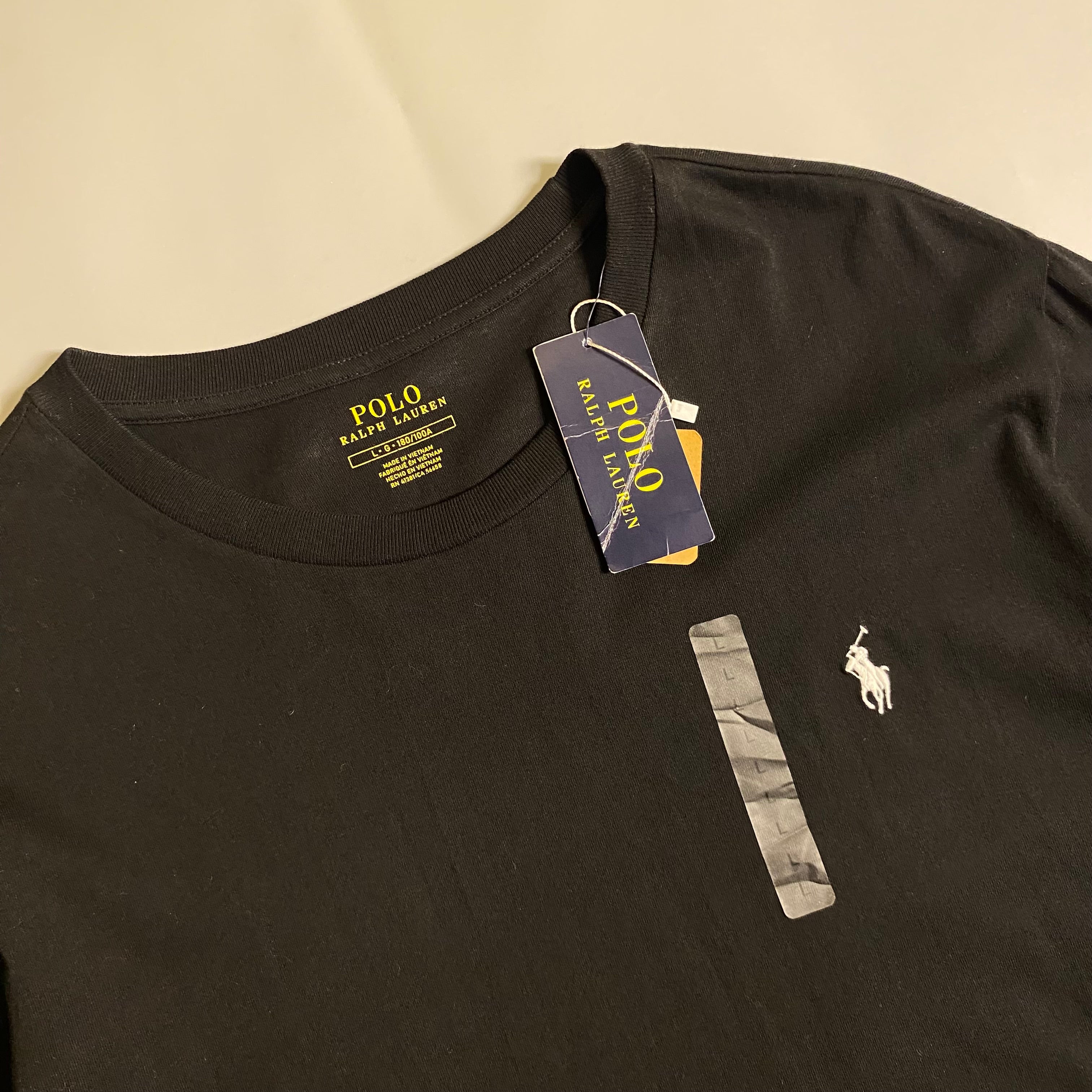 Polo Ralph Lauren black long-sleeve cotton crewneck t-shirt with a white embroidered pony logo on the chest