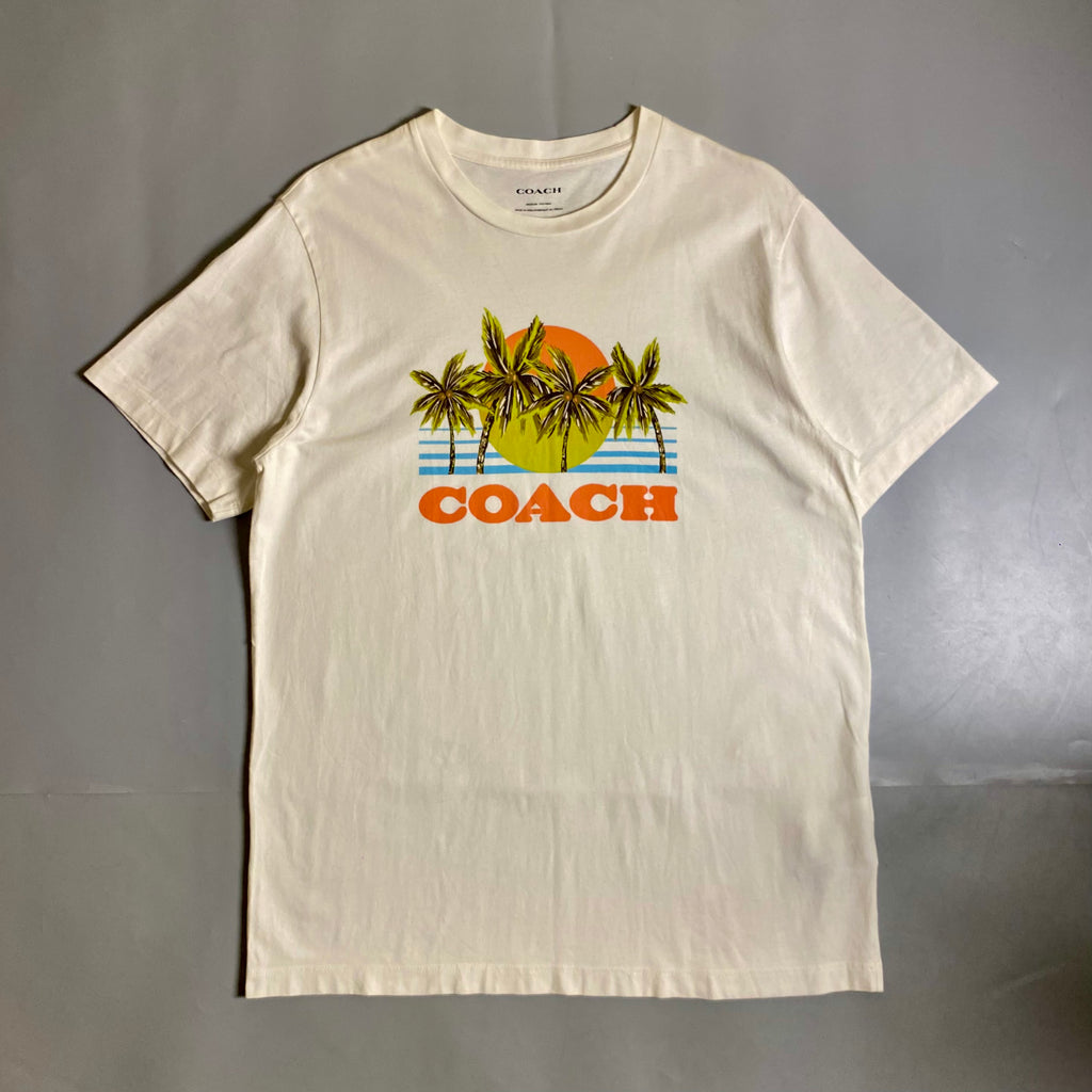 Coach Hawaiian Graphic T-shirt featuring a palm tree and sunset design