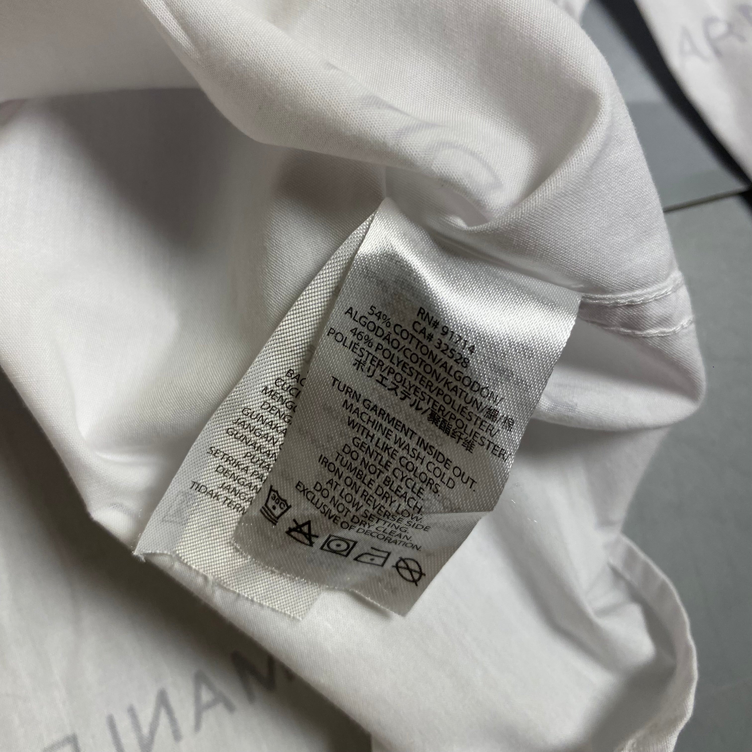 Armani Exchange men's long sleeve button-down shirt featuring an all-over printed logo design