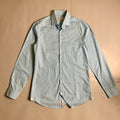 Michael Kors light blue long-sleeve &nbsp;shirt featuring a subtle micro-pattern and embroidered MK logo on the chest