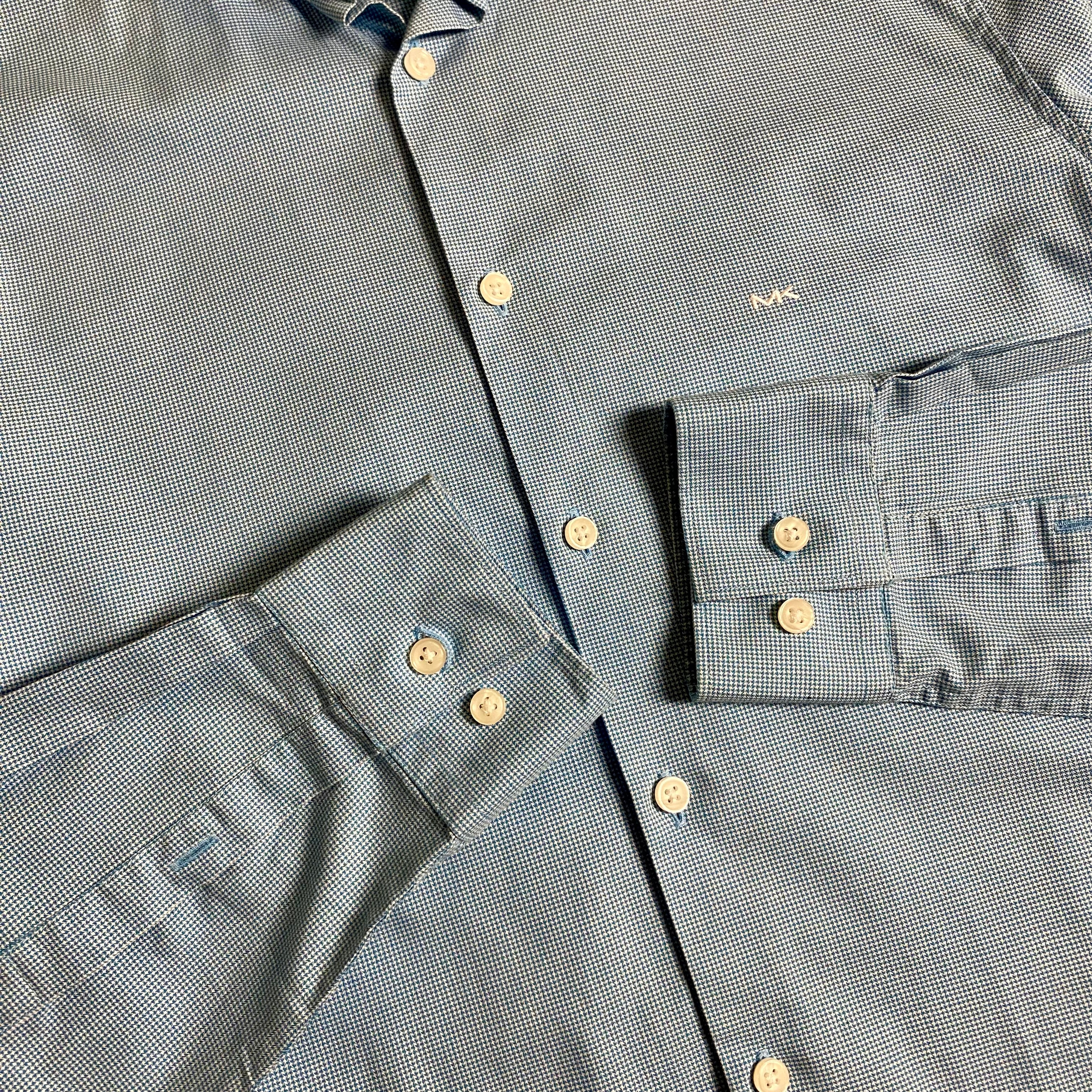 Michael Kors light blue long-sleeve &nbsp;shirt featuring a subtle micro-pattern and embroidered MK logo on the chest