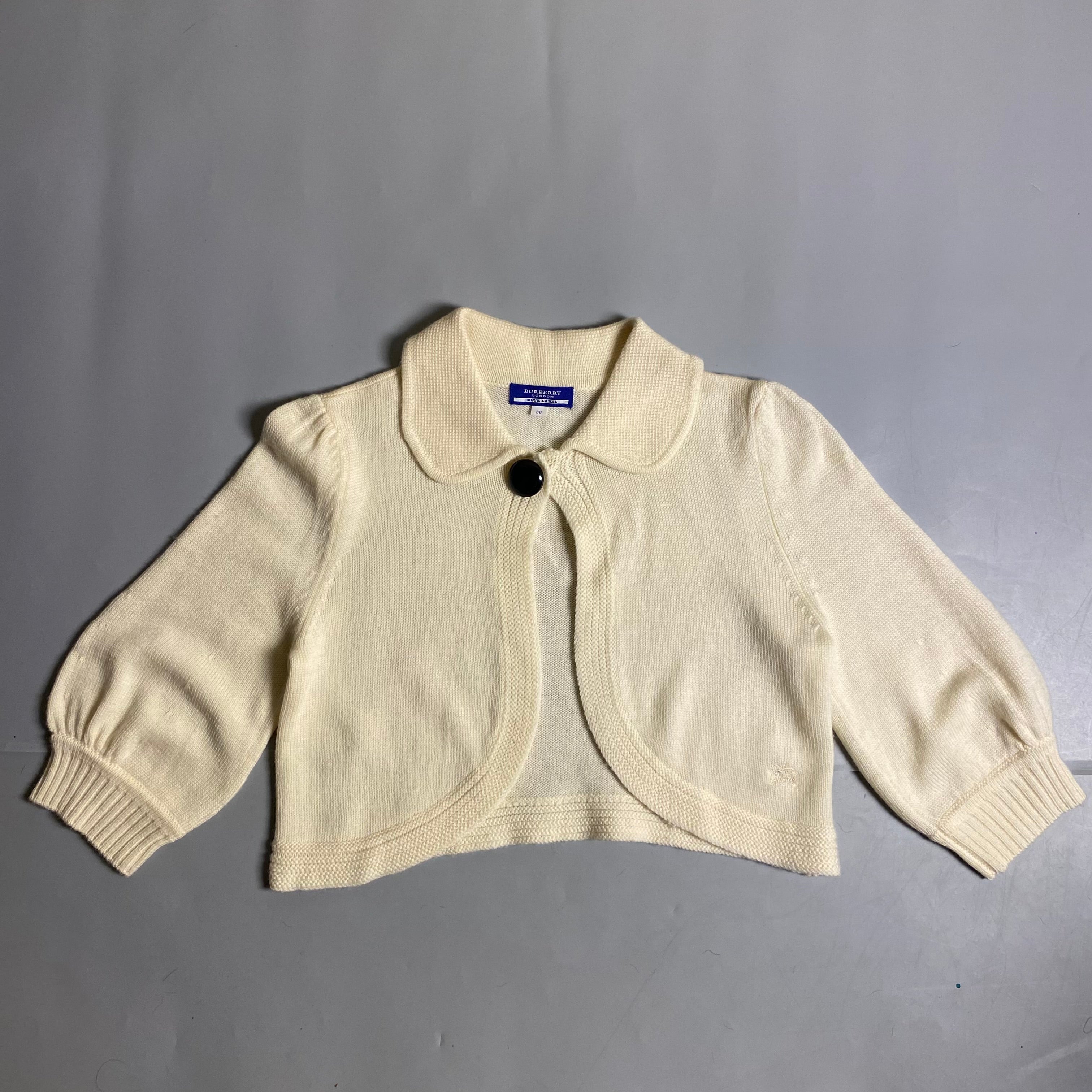 Burberry Blue Label cream knit cropped cardigan with a single button closure