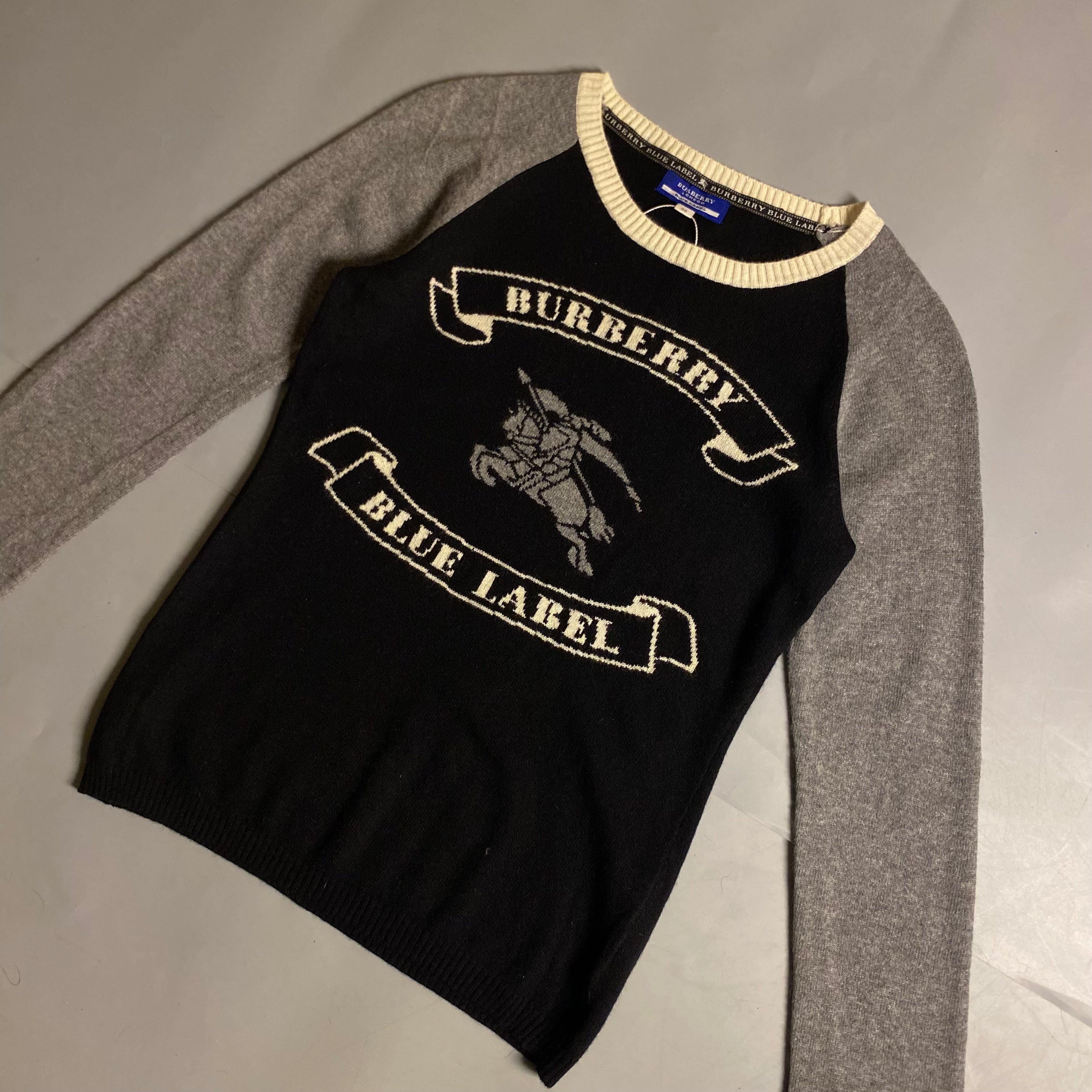 Burberry Blue Label cashmere blend knit sweater featuring an embroidered equestrian knight motif