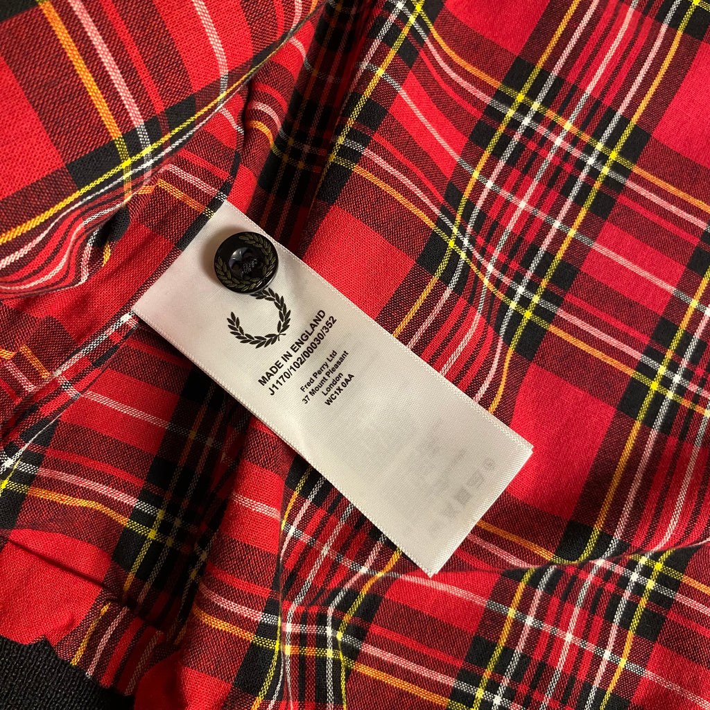 Fred Perry Made In England Harrington Jacket in black with a red tartan lining