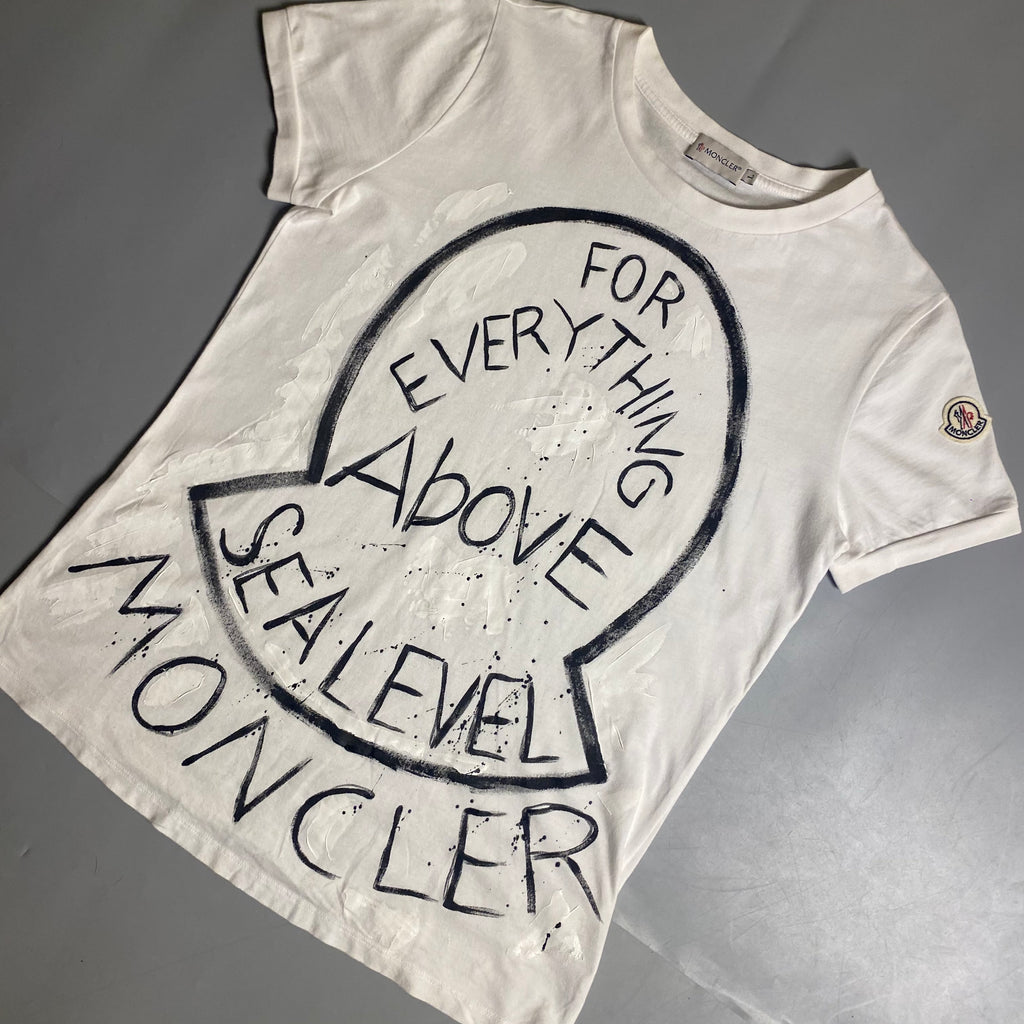 Moncler T-shirt featuring a hand-painted "For Everything Above Sea Level" graphic