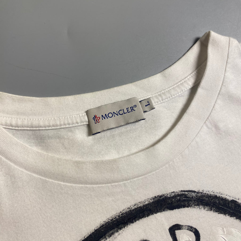 Moncler T-shirt featuring a hand-painted "For Everything Above Sea Level" graphic